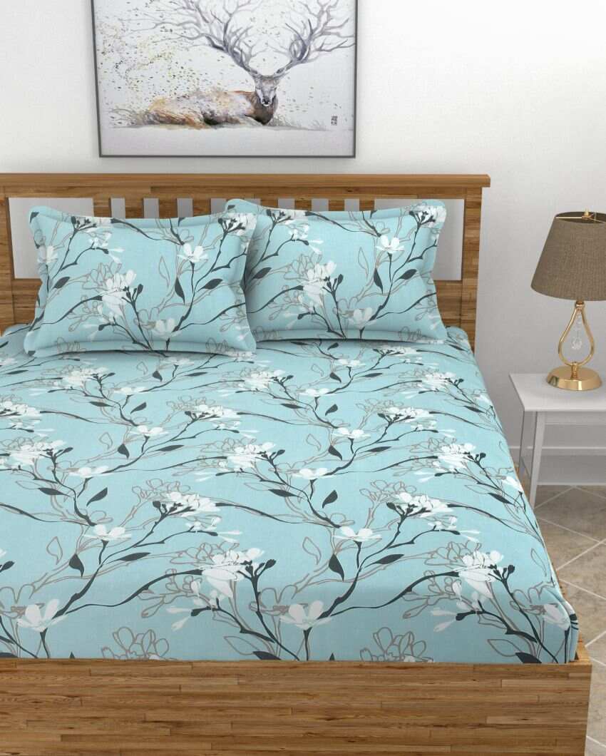 Sky Blue Lilly Flowers Glace Cotton King Size Bedsheet Set | 108 × 108 inches | 210 TC
