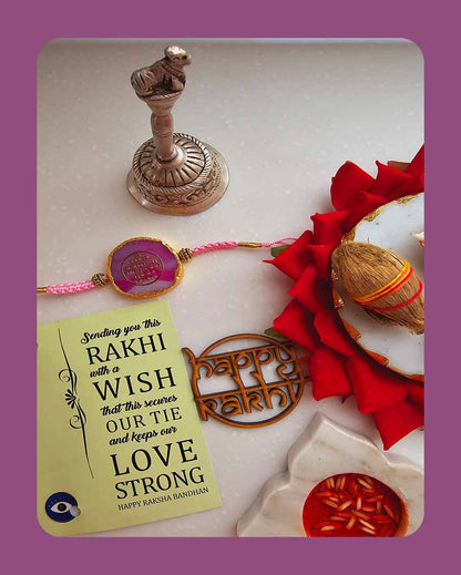 Pink Gyatri Mantra Rakhi With Roli Chawal And Lotus Platter With Diya For Raksha Bandhan