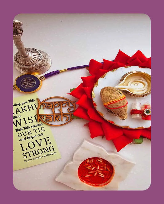 Purple Gyatri Mantra Rakhi With Roli Chawal And Lotus Platter With Diya For Raksha Bandhan