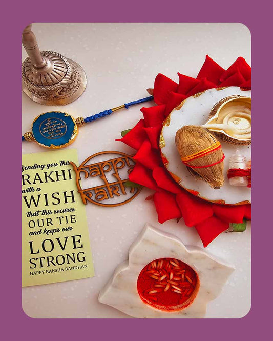 Turquorise Gyatri Mantra Rakhi With Roli Chawal And Lotus Platter With Diya For Raksha Bandhan