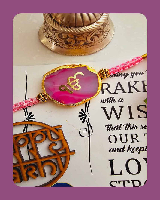 Pink Onkar Rakhi With Roli Chawal For Raksha Bandhan