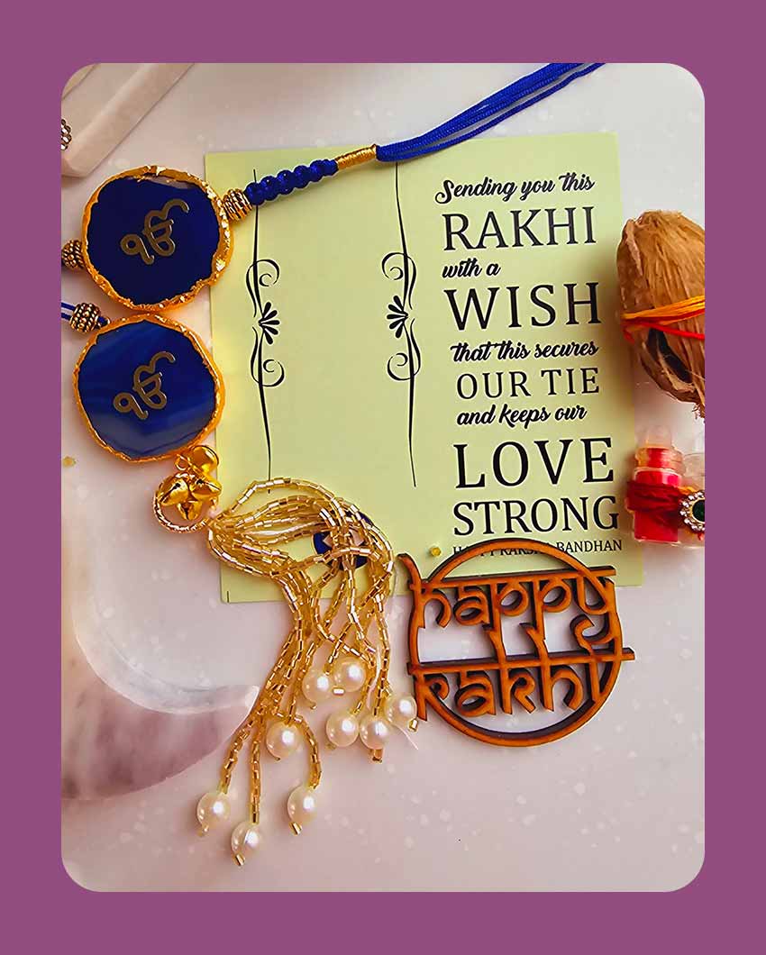 Blue Ik Onkar Couple Rakhi With Roli Chawal And Lotus Platter With Diya For Raksha Bandhan