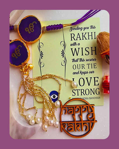 Purple Ik Onkar Couple Rakhi With Roli Chawal And Lotus Platter With Diya For Raksha Bandhan
