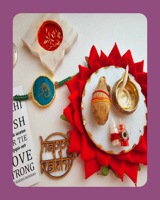 Green Om Ganesha Rakhi With Roli Chawal And Lotus Platter With Diya For Raksha Bandhan