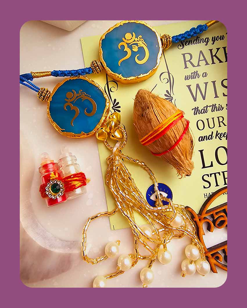 Om Ganesha Couple Rakhi With Roli Chawal And Lotus Platter With Diya For Raksha Bandhan