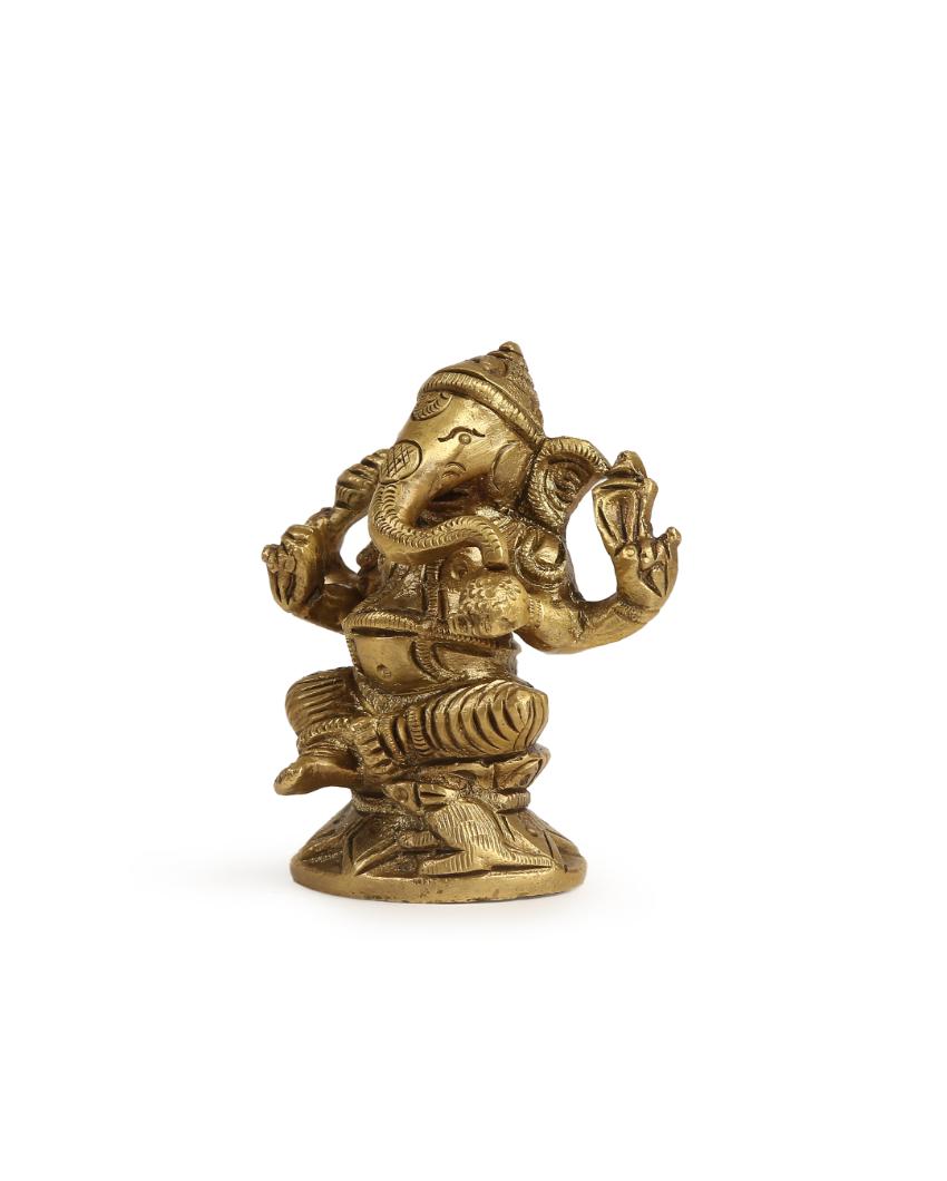 Brass Ganesh On A Round Base Showpiece