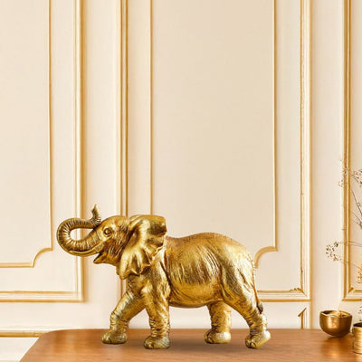 Regal Golden Polyresin Elephant Showpiece | 7 x 12 inches