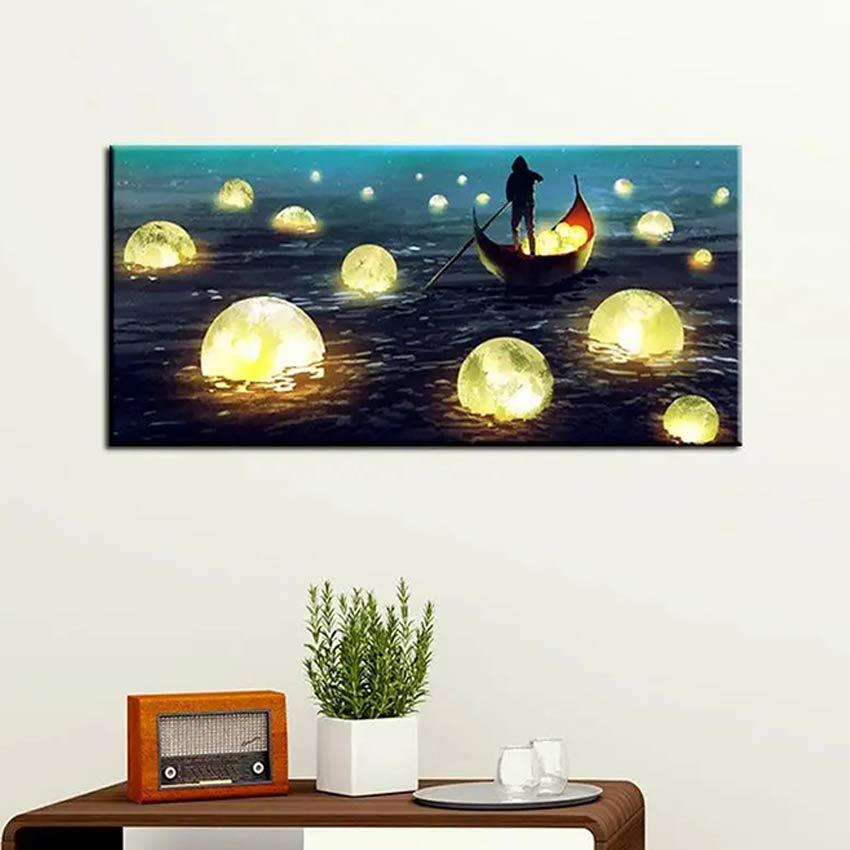 Man Rowing Boat & Collect Glowing Moons Wall Painting