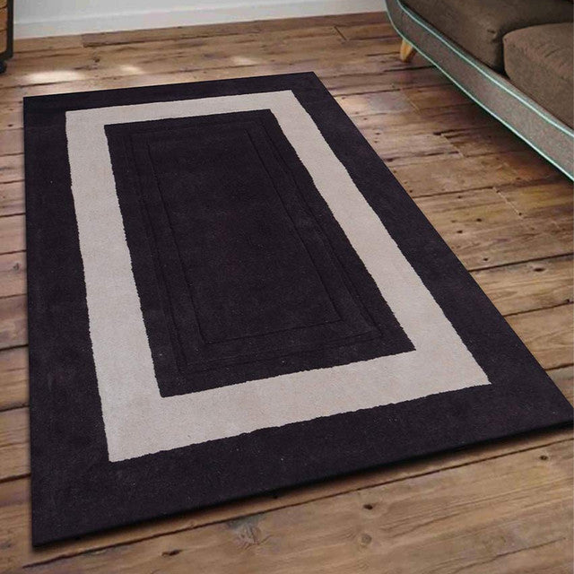 Sleek Solid Brown Hand Tufted Wool Carpet