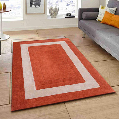 Inventive Orange Solid Hand Tufted Wool Carpet