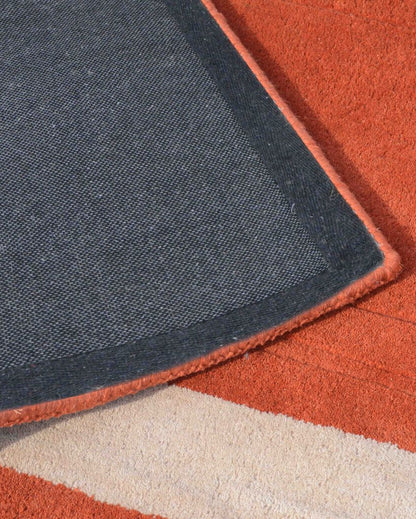 Inventive Orange Solid Hand Tufted Wool Carpet