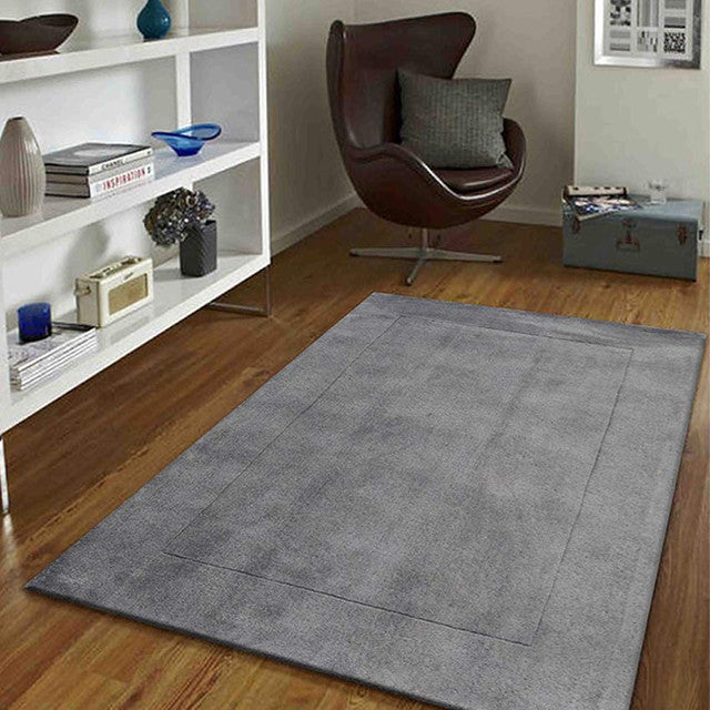 Sleek Solid Grey Hand Tufted Wool Carpet