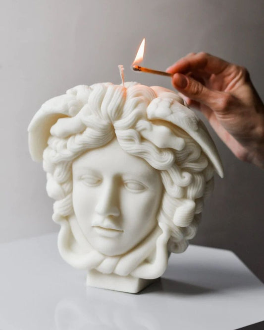 Medusa head sculpture candle