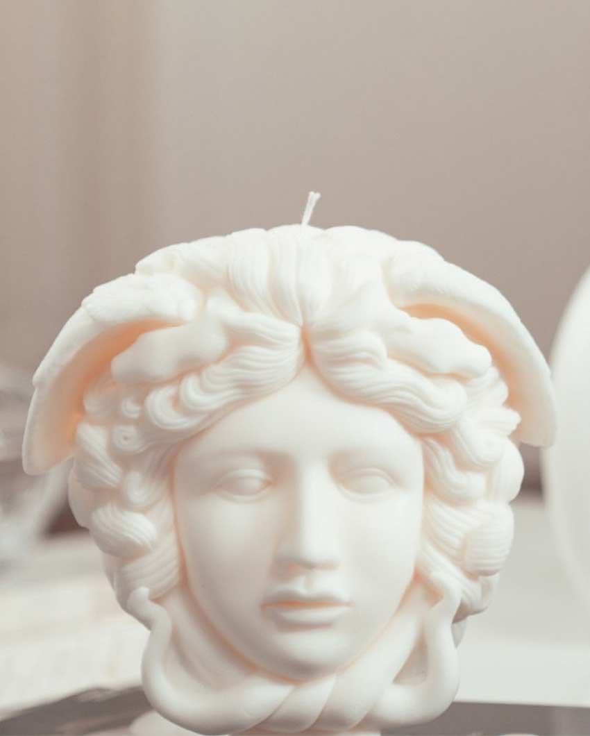 Medusa head sculpture candle