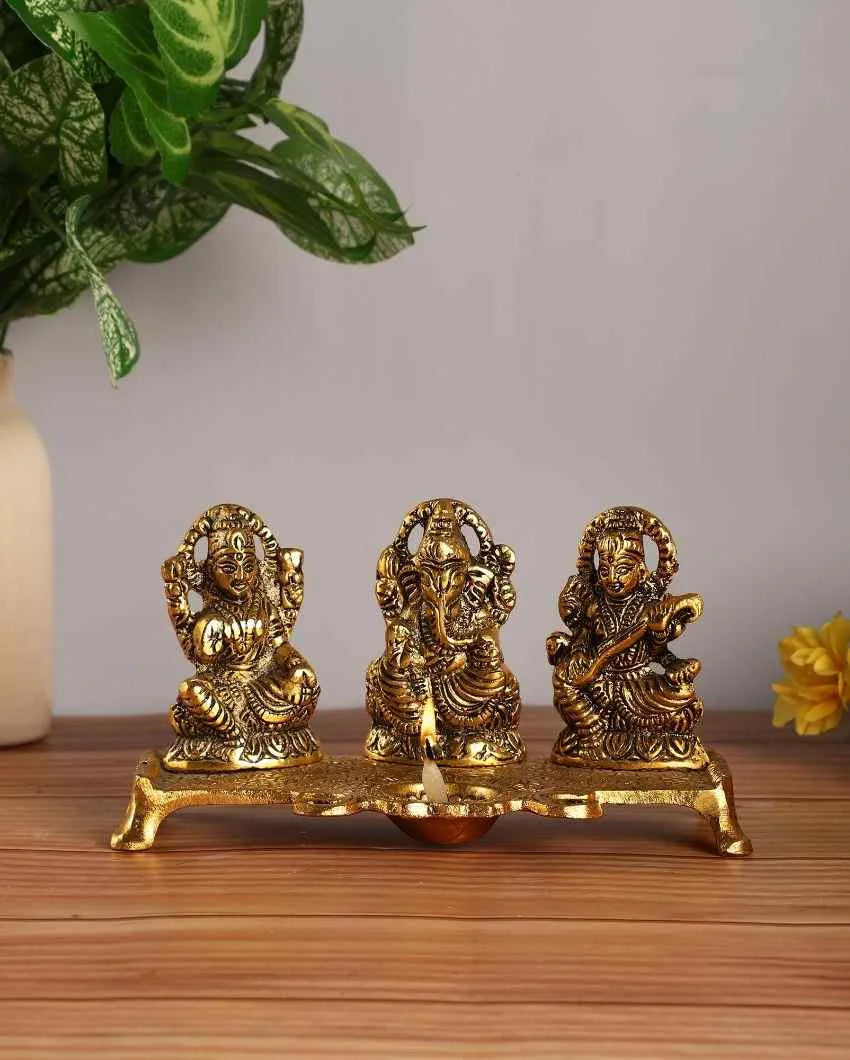 Goddess Laxmi Ganesh Saraswati Idol With Diya