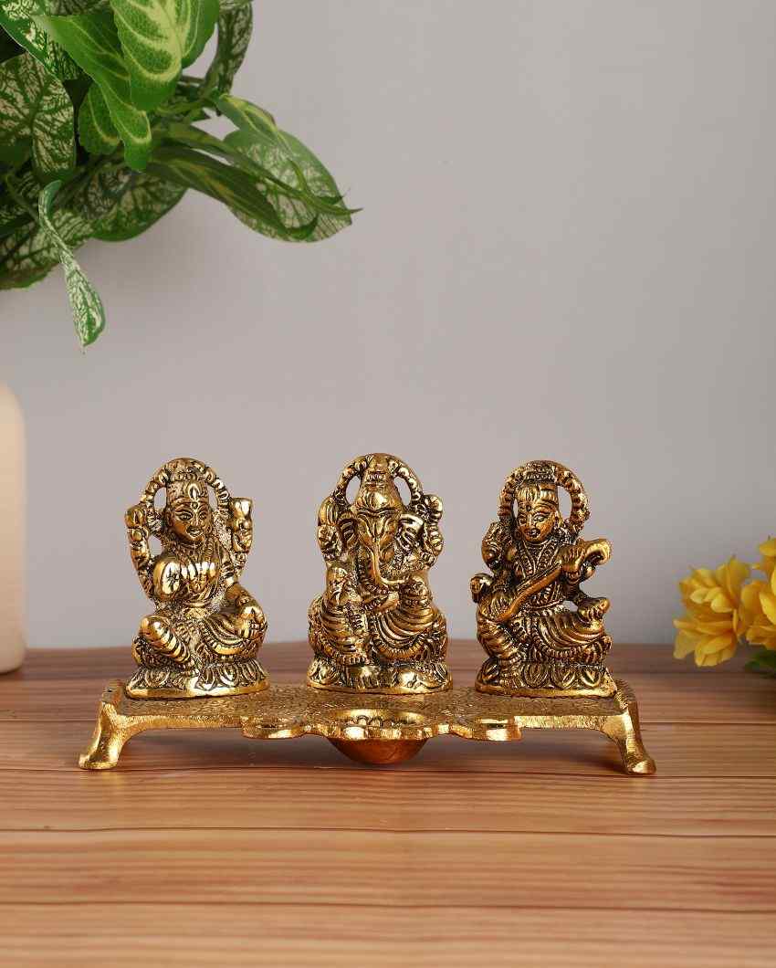 Goddess Laxmi Ganesh Saraswati Idol With Diya