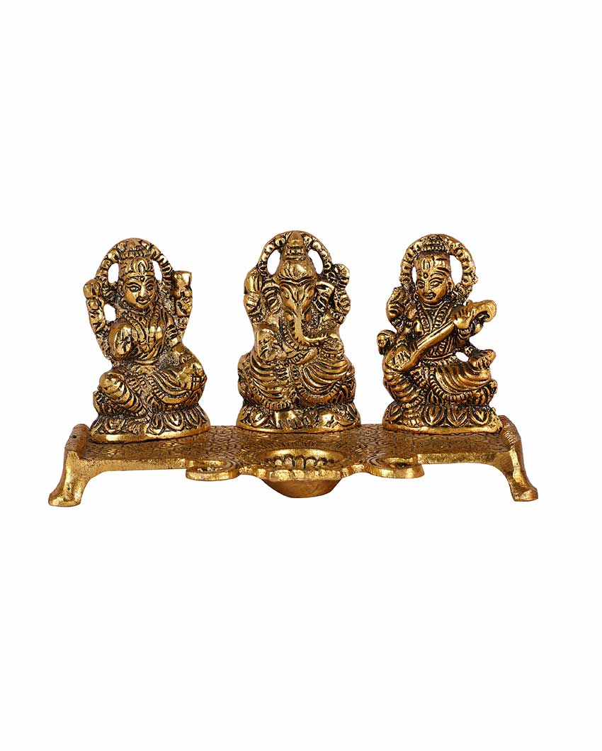 Goddess Laxmi Ganesh Saraswati Idol With Diya