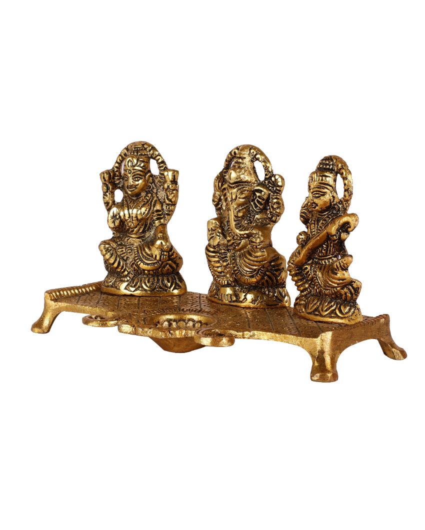 Goddess Laxmi Ganesh Saraswati Idol With Diya