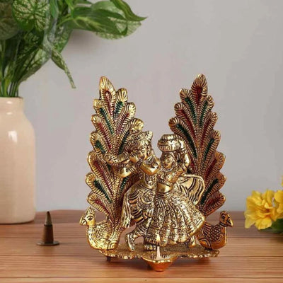 Radha Krishna Metal Statue With Diya And Peacock