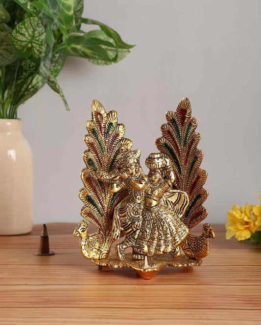 Radha Krishna Metal Statues With Diya And Peacock