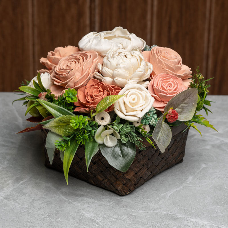 Peach Beauty Solawood Flower Arrangement In Brown Bamboo Basket