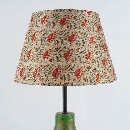 Green Sphere Shaped Lamp With Beige Floral Shade