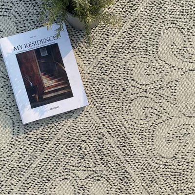 Stylish Off-White Batik Reversible Floor Covering Rug