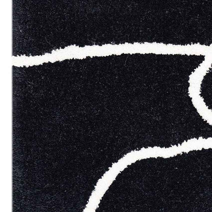 Bold Black Turmoil Wool Floor Covering Rug